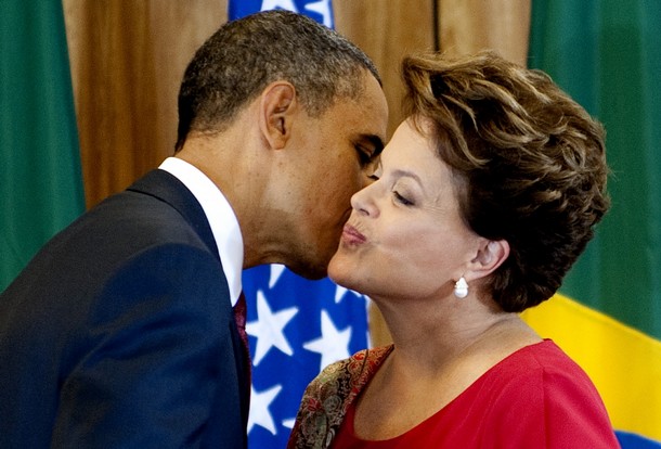 US President Barack Obama (L) kisses Bra