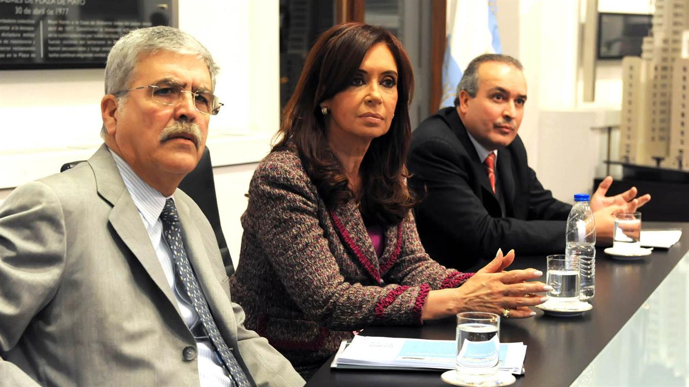 Cristina Fernández, el ex ministro de Planificación, Julio De Vido y José López